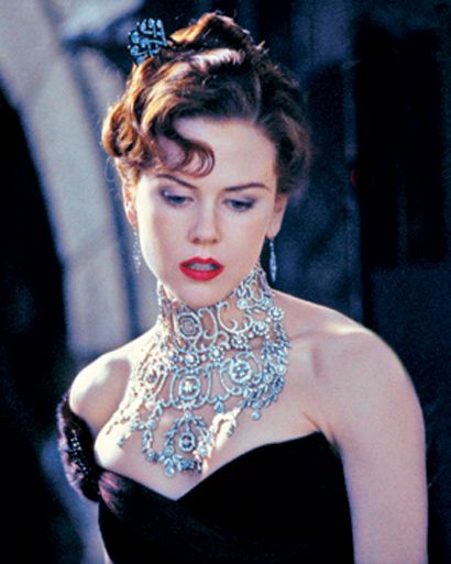 Still from Moulin Rouge showing Nicole Kidman wearing the Edwardian inspired lace-like diamond necklace.