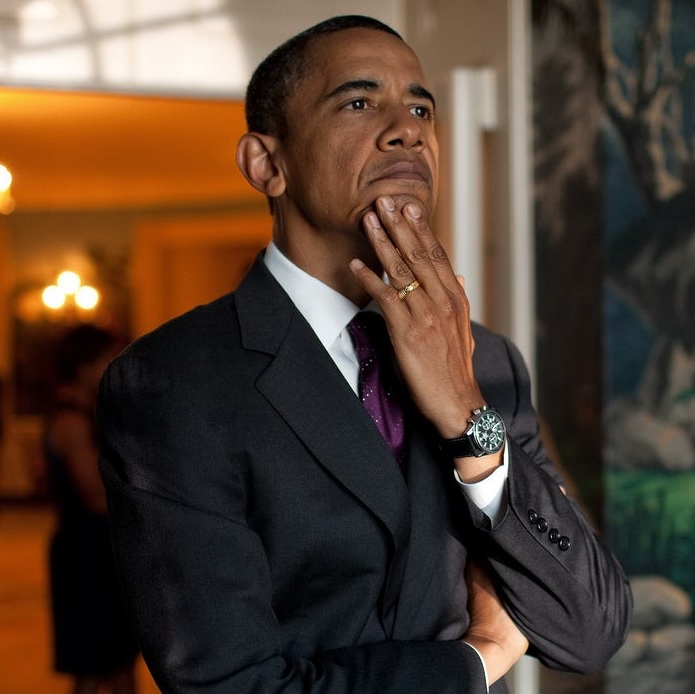 Barack Obama wearing a luxury watch.