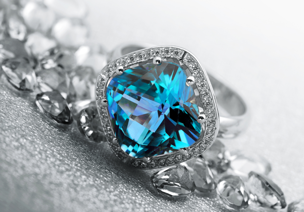 blue zircon ring with diamond halo