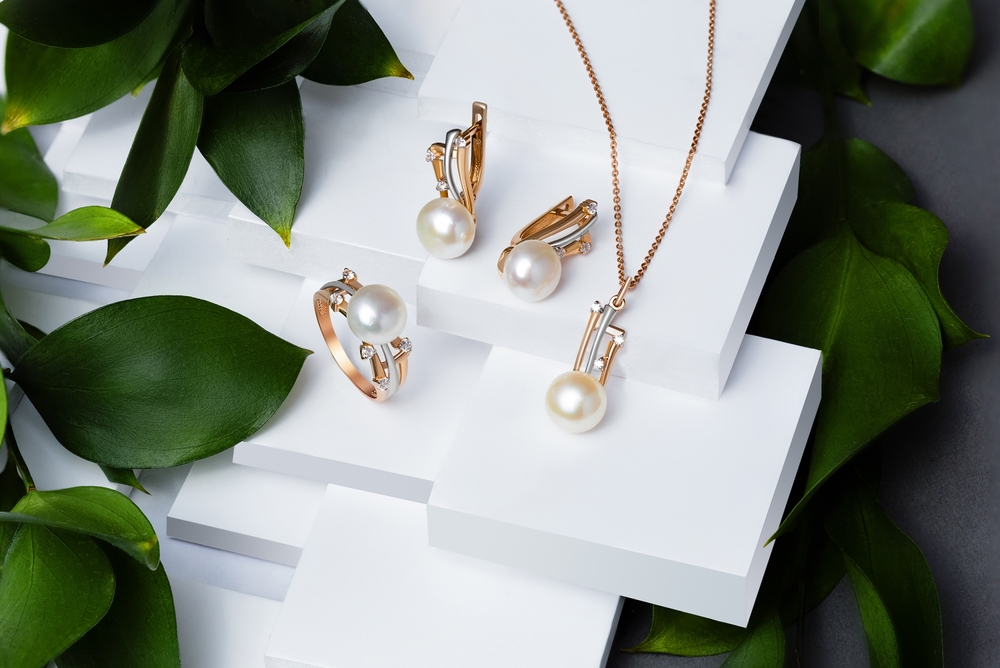 pearl necklace, earrings, and ring