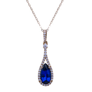 white gold lab-grown blue sapphire pear halo pendant surrounded with diamonds