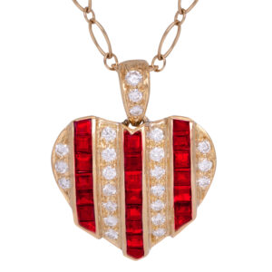 gold heart pendant set with vertical rows of rubies & diamonds