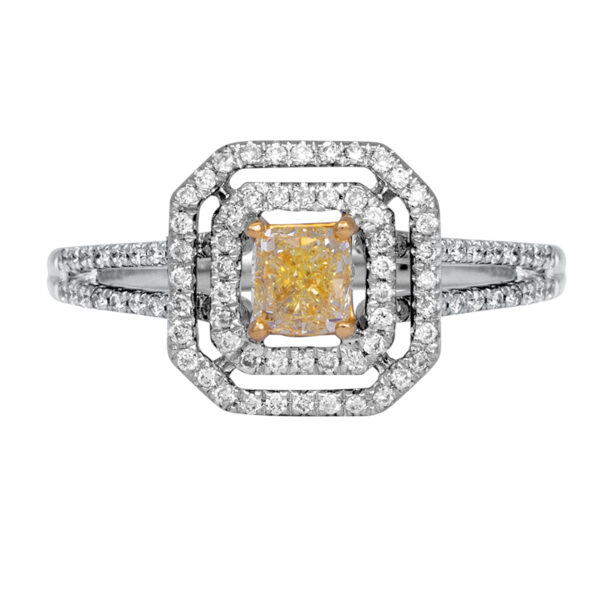 white and yellow gold double diamond halo engagement ring centered with a fancy yellow cushion cut diamond