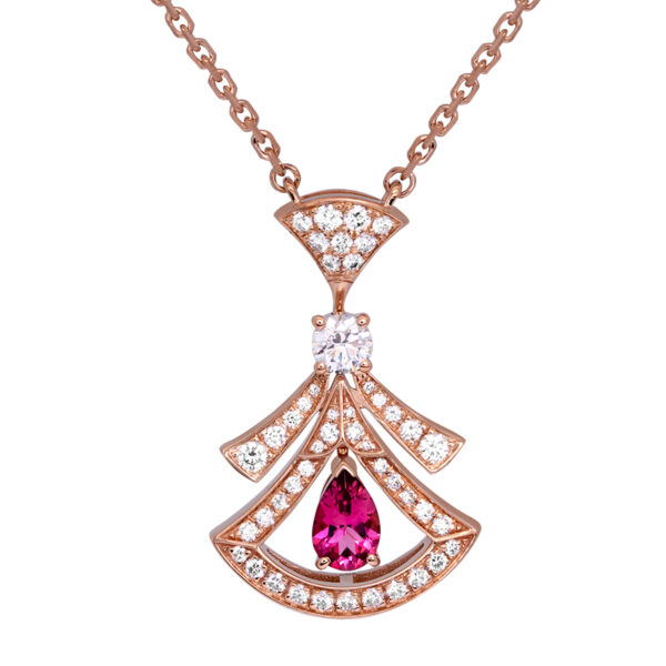 designer pendant set with a pear shaped rubellite tourmlaine surrounded by diamonds