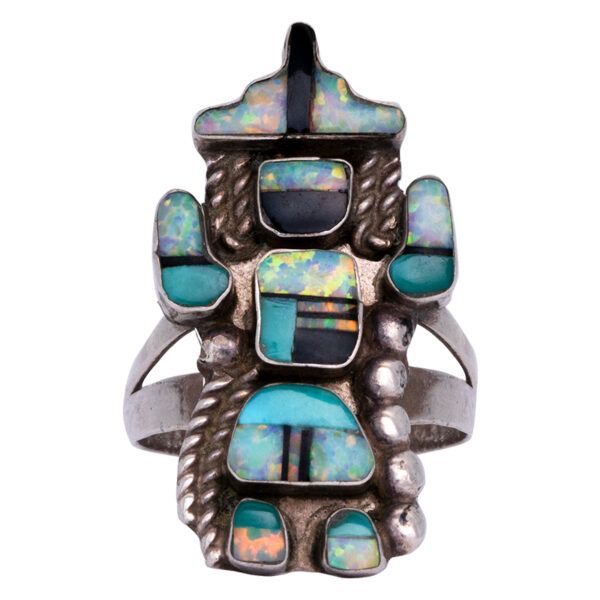 aztec style figure ring set with turquoise, opal, and onyx