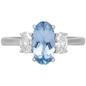 white gold aquamarine colored spinel and diamond 3 stone ring