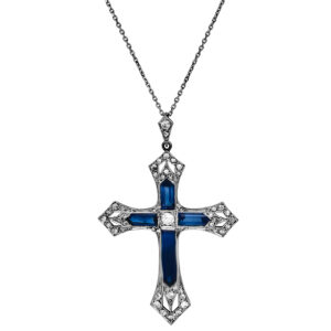 white gold and platinum cross pendant set with blue sapphires and diamonds